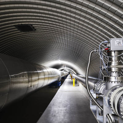 One of the tunnels of the Virgo detector, in the tube on the left runs the laser, in the one on the right is part of the 'squeezing' cavity that cleans the light from quantum noise © Enrico Sacchetti
